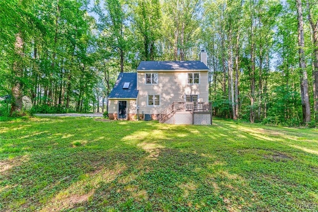 4381 Three Bridge Rd, Powhatan, VA 23139 - rear view of property with a chimney, a deck, a lawn, and stairs