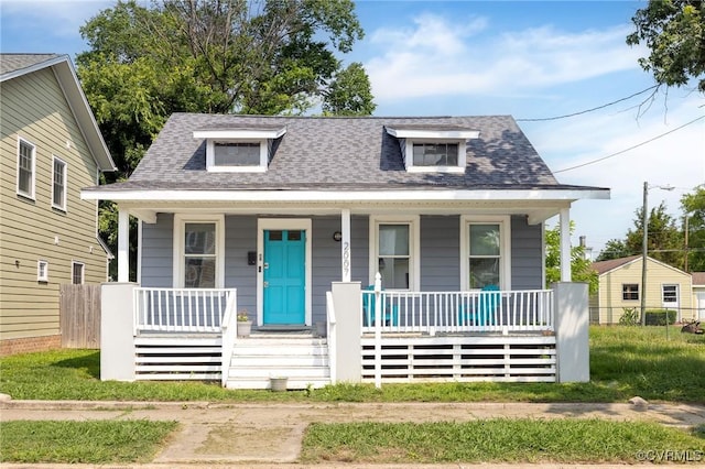 2007 Albany Ave, Richmond, VA 23224 - bungalow featuring a porch and roof with shingles