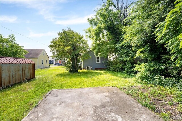 2007 Albany Ave, Richmond, VA 23224 - view of grassy yard featuring a patio