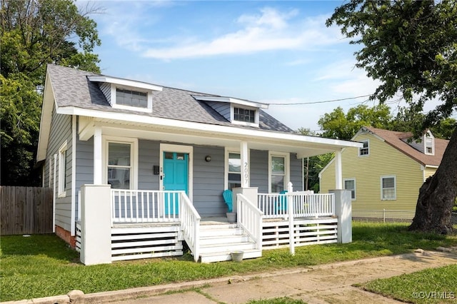 2007 Albany Ave, Richmond, VA 23224 - bungalow featuring a porch and roof with shingles
