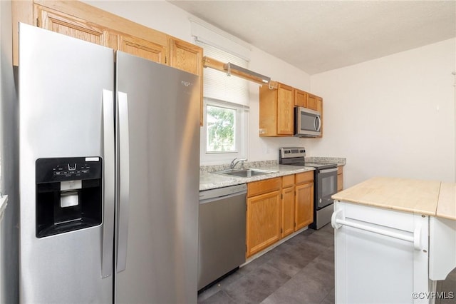 2007 Albany Ave, Richmond, VA 23224 - kitchen with stainless steel appliances, a sink, and light countertops