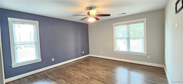 379 Moncuin Ct, Manquin, VA 23106 - spare room featuring wood finished floors, baseboards, and ceiling fan