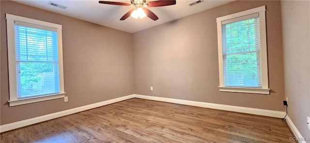 379 Moncuin Ct, Manquin, VA 23106 - empty room featuring healthy amount of natural light, wood finished floors, and ceiling fan