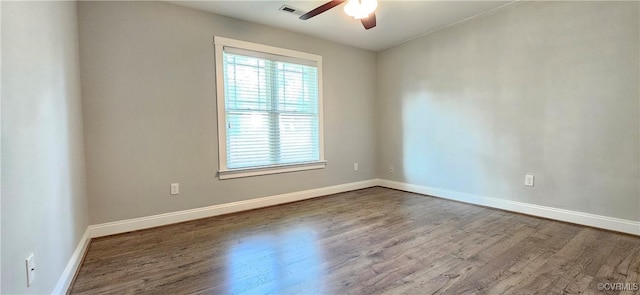 379 Moncuin Ct, Manquin, VA 23106 - empty room featuring dark wood finished floors, ceiling fan, and baseboards