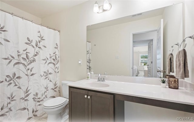 18304 Palisades Ct, Moseley, VA 23120 - bathroom with ensuite bathroom, vanity, and curtained shower