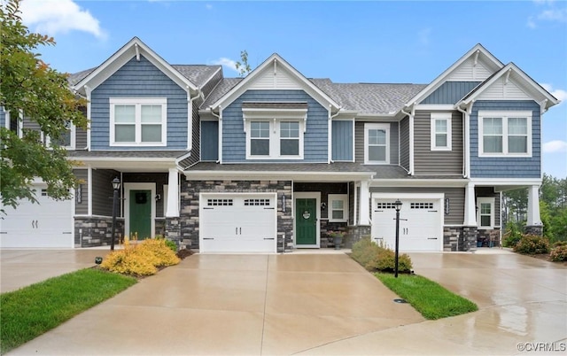 18304 Palisades Ct, Moseley, VA 23120 - craftsman inspired home with a garage, driveway, a porch, and stone siding