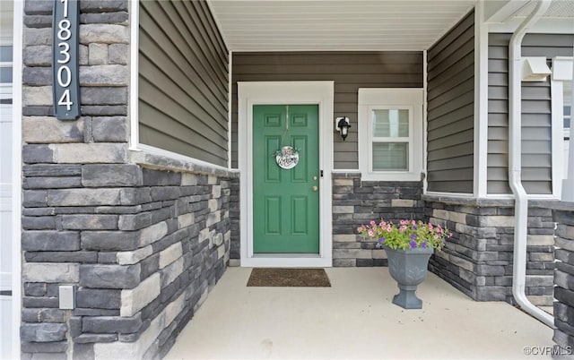18304 Palisades Ct, Moseley, VA 23120 - entrance to property with stone siding and a porch
