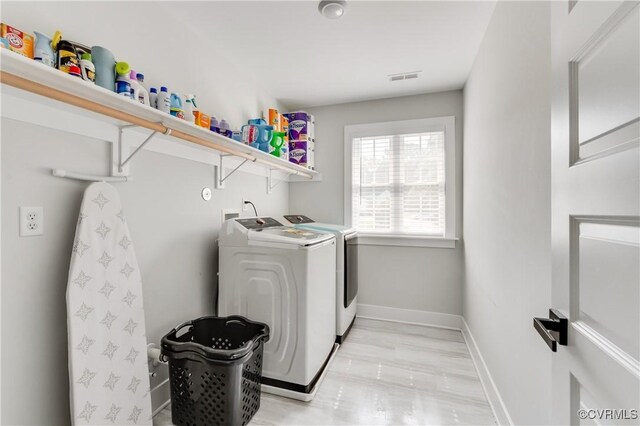 15606 Corte Castle Ter, Chesterfield, VA 23838 - laundry area featuring washing machine and dryer and baseboards