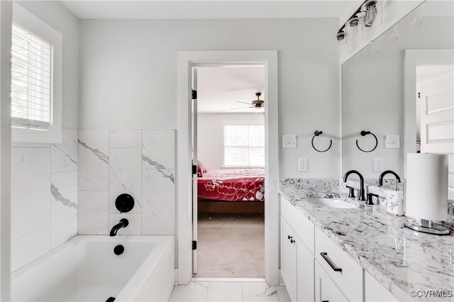 15606 Corte Castle Ter, Chesterfield, VA 23838 - ensuite bathroom featuring vanity, a bathtub, ceiling fan, and marble look tile flooring