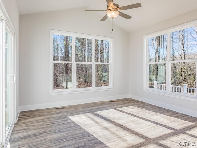 LOT8 Whartons Pass, Unionville, VA 22567 - empty room with plenty of natural light, baseboards, lofted ceiling, wood finished floors, and ceiling fan
