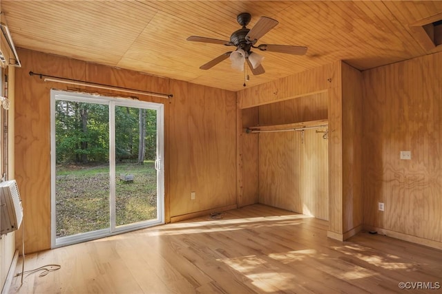 3966 Holts Ln, Saluda, VA 23149 - unfurnished bedroom with wood ceiling, access to outside, a closet, wood walls, and wood finished floors