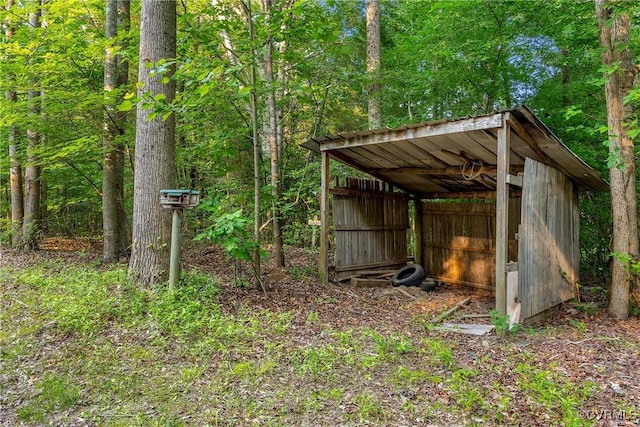 3966 Holts Ln, Saluda, VA 23149 - view of pole building featuring a forest view