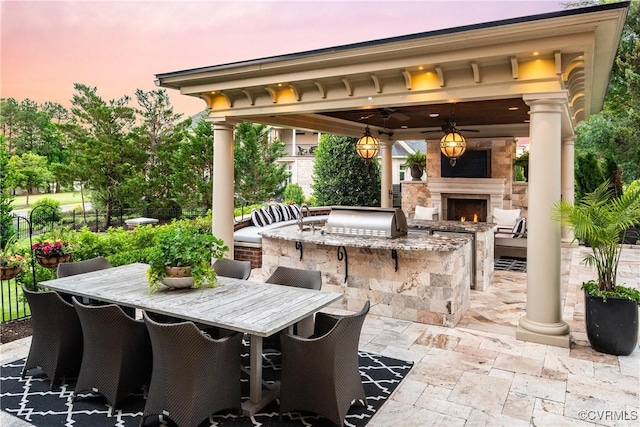 11905 Lerade Ct, Glen Allen, VA 23059 - view of patio / terrace with a lit fireplace and a gazebo