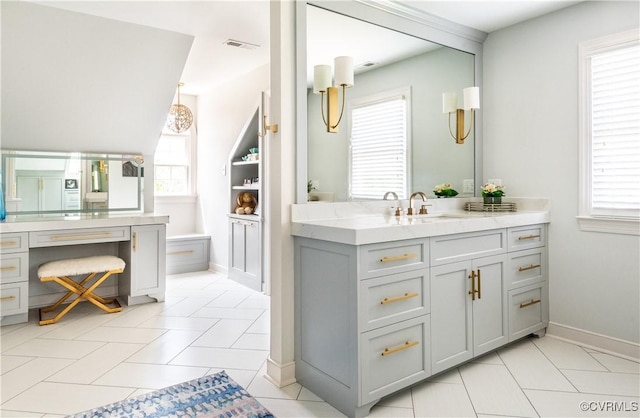 11905 Lerade Ct, Glen Allen, VA 23059 - full bathroom with two vanities, tile patterned floors, and baseboards
