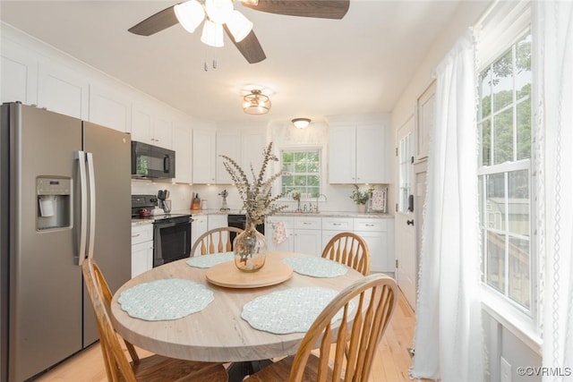 7313 Key Deer Cir, Midlothian, VA 23112 - dining space featuring ceiling fan and light wood-type flooring