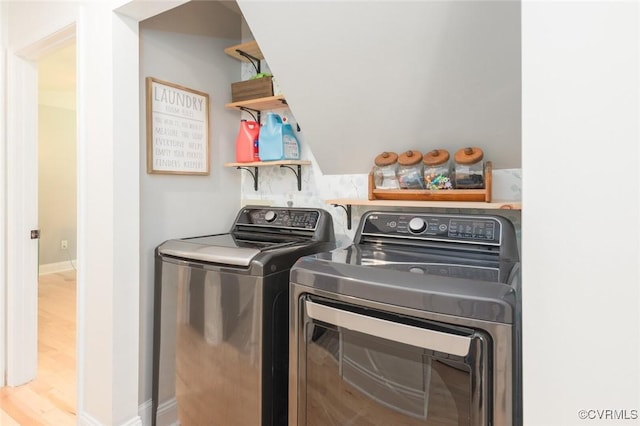 7313 Key Deer Cir, Midlothian, VA 23112 - washroom featuring separate washer and dryer, wood finished floors, and baseboards