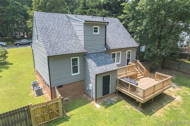 7313 Key Deer Cir, Midlothian, VA 23112 - back of property featuring roof with shingles, a wooden deck, and central AC