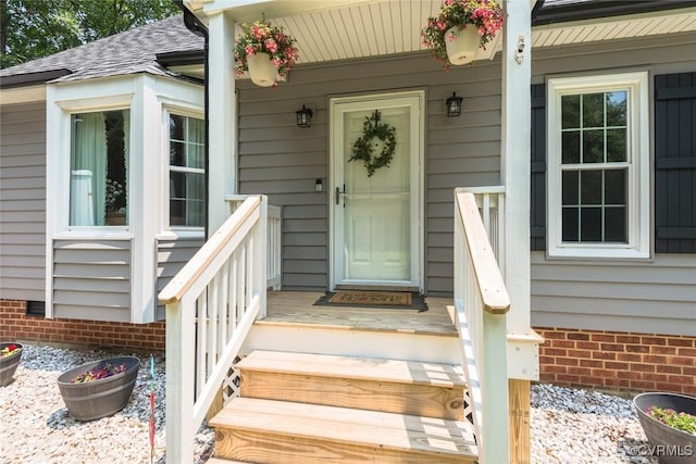 7313 Key Deer Cir, Midlothian, VA 23112 - property entrance featuring covered porch, roof with shingles, and crawl space