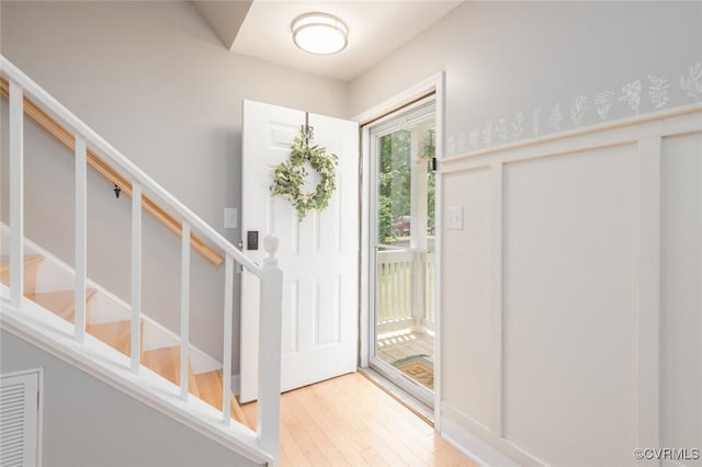 7313 Key Deer Cir, Midlothian, VA 23112 - entrance foyer featuring stairs and wood finished floors