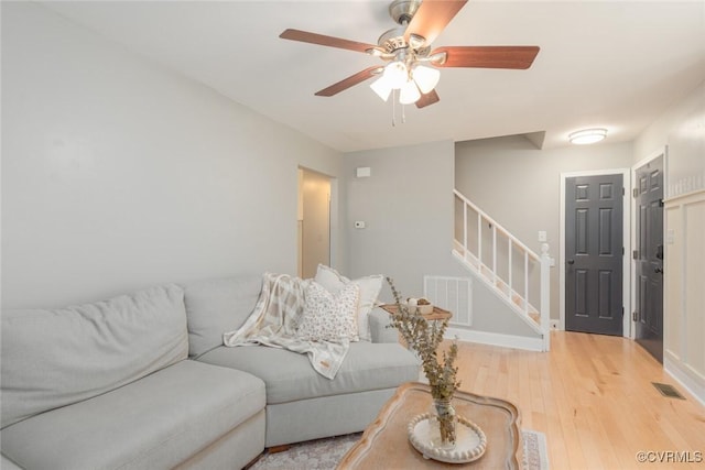 7313 Key Deer Cir, Midlothian, VA 23112 - living area featuring light wood-style floors, stairs, and ceiling fan