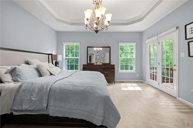 1012 Water Beech Rd, Midlothian, VA 23114 - bedroom with a chandelier, access to exterior, light carpet, multiple windows, and crown molding