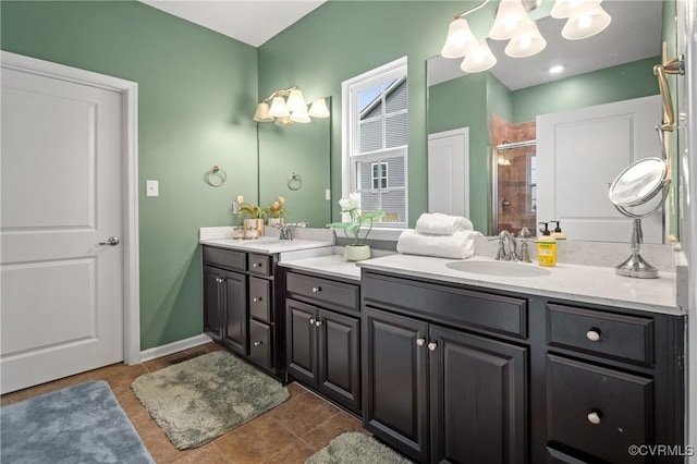 1012 Water Beech Rd, Midlothian, VA 23114 - bathroom with double vanity, a shower stall, a chandelier, and tile patterned flooring
