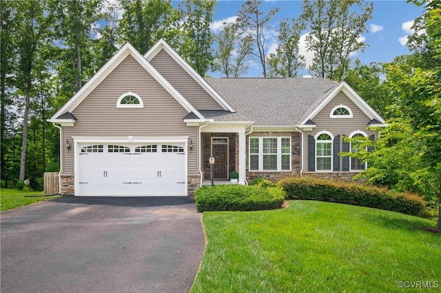 1012 Water Beech Rd, Midlothian, VA 23114 - view of front of home featuring stone siding, driveway, a front lawn, and a garage