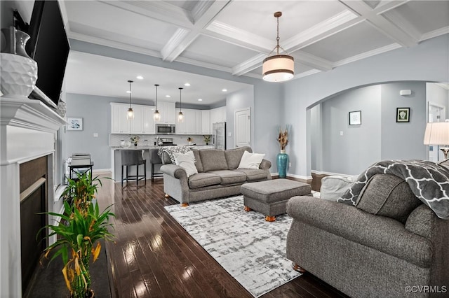 1012 Water Beech Rd, Midlothian, VA 23114 - living area with arched walkways, dark wood finished floors, a fireplace, coffered ceiling, and beam ceiling
