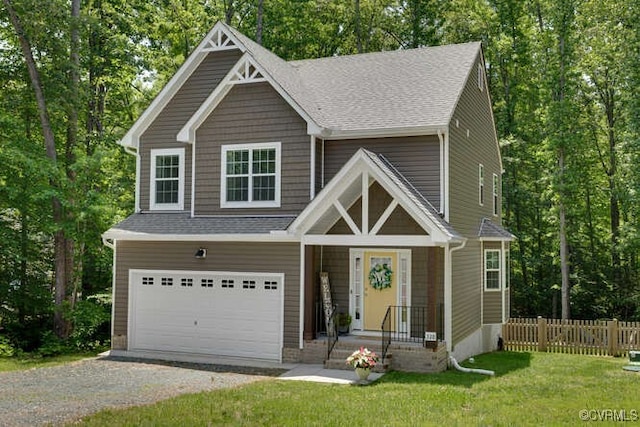 328 Peregrine Pl, Louisa, VA 23093 - craftsman-style home with gravel driveway, an attached garage, and a shingled roof