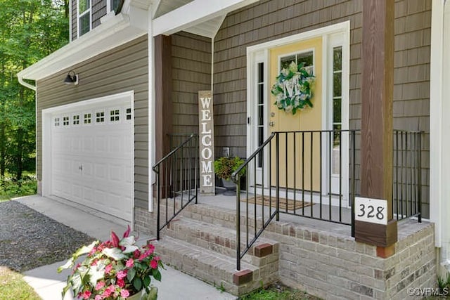 328 Peregrine Pl, Louisa, VA 23093 - view of exterior entry featuring a garage and gravel driveway