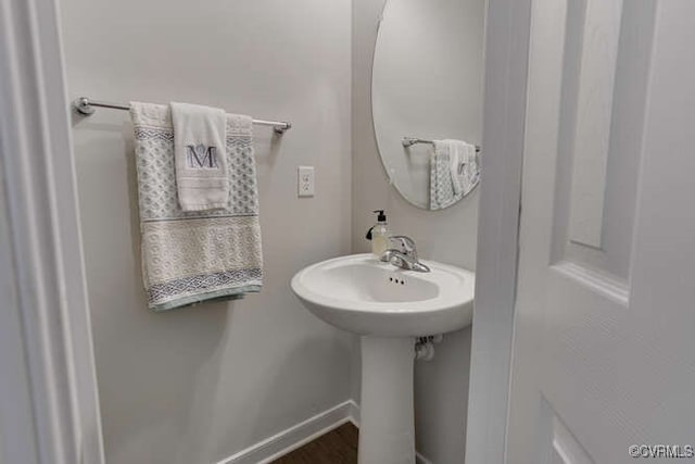 328 Peregrine Pl, Louisa, VA 23093 - bathroom with baseboards and wood finished floors