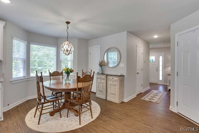 328 Peregrine Pl, Louisa, VA 23093 - dining area featuring healthy amount of natural light, dark wood finished floors, a chandelier, and recessed lighting
