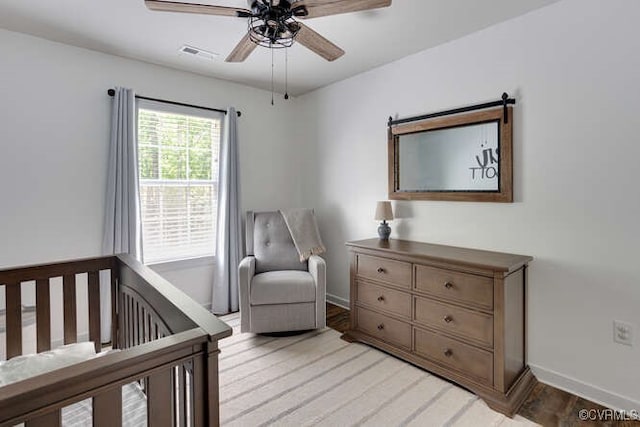 328 Peregrine Pl, Louisa, VA 23093 - bedroom with light wood-type flooring and a ceiling fan