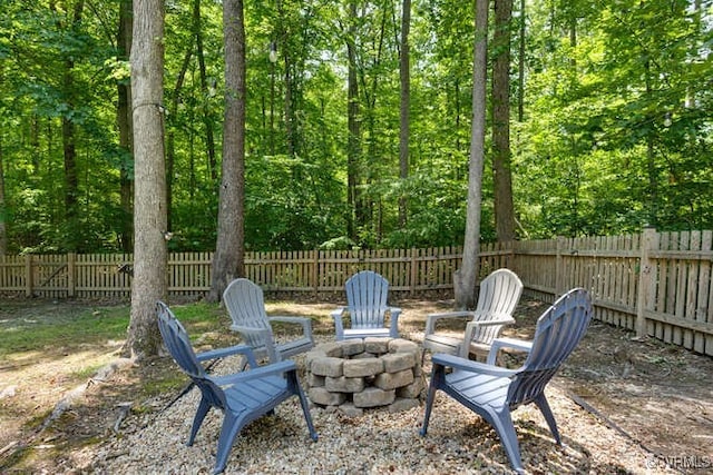 328 Peregrine Pl, Louisa, VA 23093 - fenced backyard with an outdoor fire pit