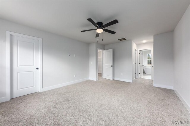 LOT9 Whartons Pass, Orange, VA 22567 - unfurnished bedroom featuring light colored carpet, baseboards, ensuite bath, and ceiling fan