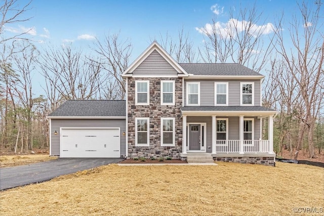 LOT9 Whartons Pass, Orange, VA 22567 - view of front facade featuring a porch, an attached garage, asphalt driveway, stone siding, and a front lawn