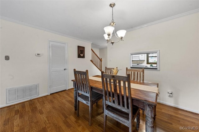 11605 E Briar Patch Dr, Midlothian, VA 23113 - dining space featuring a chandelier, wood finished floors, baseboards, and ornamental molding