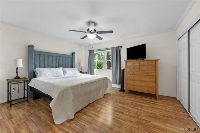 11605 E Briar Patch Dr, Midlothian, VA 23113 - bedroom with ornamental molding, light wood-style flooring, a closet, ceiling fan, and baseboards
