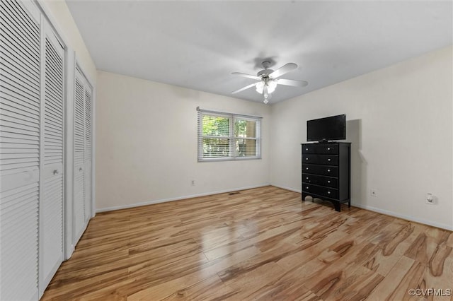 11605 E Briar Patch Dr, Midlothian, VA 23113 - unfurnished bedroom with light wood finished floors, baseboards, and a ceiling fan