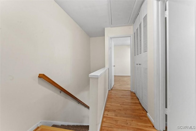 11605 E Briar Patch Dr, Midlothian, VA 23113 - hall with an upstairs landing, light wood-style flooring, attic access, and baseboards