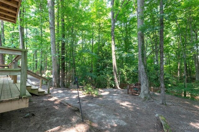 3301 E Princeton Rd, Petersburg, VA 23805 - view of yard featuring a wooded view and a deck