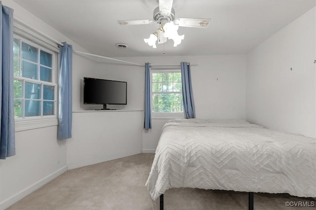 3301 E Princeton Rd, Petersburg, VA 23805 - bedroom featuring carpet, ceiling fan, and baseboards