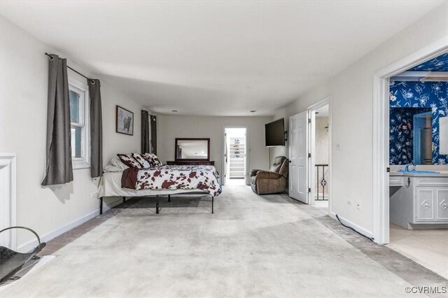 3301 E Princeton Rd, Petersburg, VA 23805 - bedroom featuring a sink, carpet floors, and baseboards