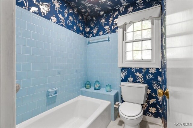 3301 E Princeton Rd, Petersburg, VA 23805 - bathroom featuring wallpapered walls, a bath, toilet, and baseboards