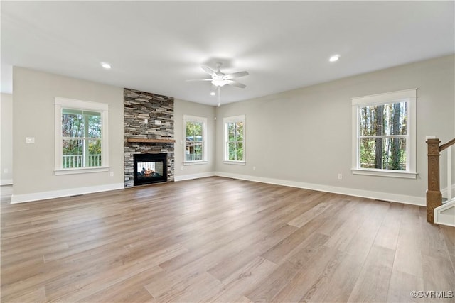 9027 Pine Hill Rd, Mechanicsville, VA 23116 - unfurnished living room featuring ceiling fan, healthy amount of natural light, light wood-style flooring, baseboards, and recessed lighting