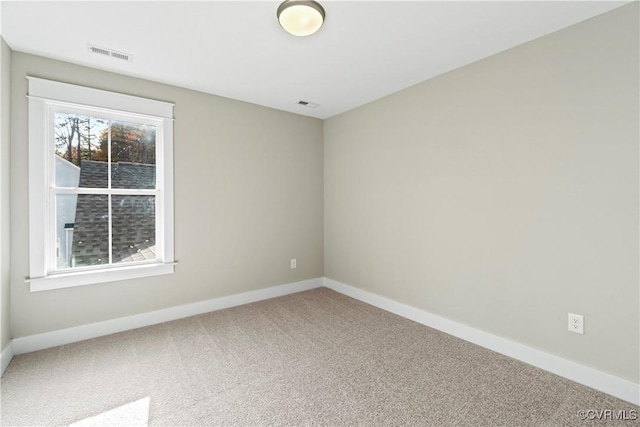 9027 Pine Hill Rd, Mechanicsville, VA 23116 - carpeted spare room featuring baseboards