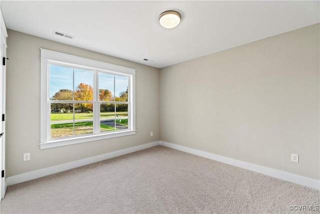 9027 Pine Hill Rd, Mechanicsville, VA 23116 - carpeted empty room featuring baseboards