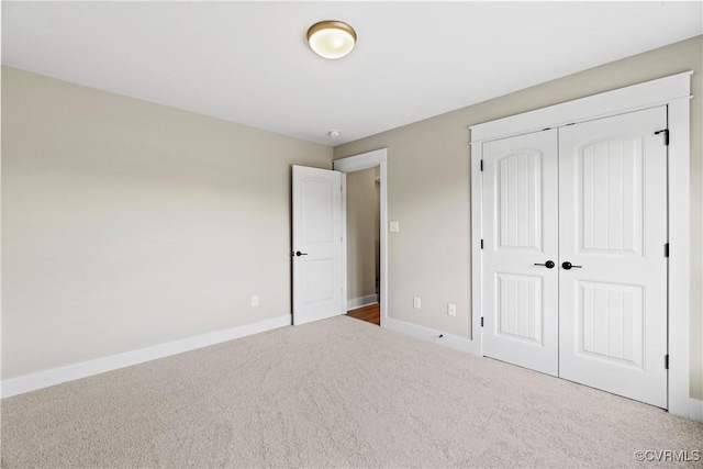 9027 Pine Hill Rd, Mechanicsville, VA 23116 - unfurnished bedroom featuring carpet flooring, baseboards, and a closet