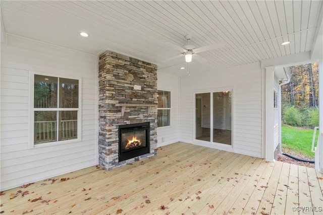9027 Pine Hill Rd, Mechanicsville, VA 23116 - wooden deck with an outdoor stone fireplace and ceiling fan