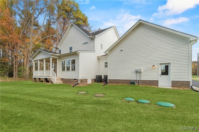 9027 Pine Hill Rd, Mechanicsville, VA 23116 - back of property with a yard, central AC unit, and crawl space
